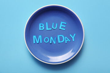 Plate with text BLUE MONDAY