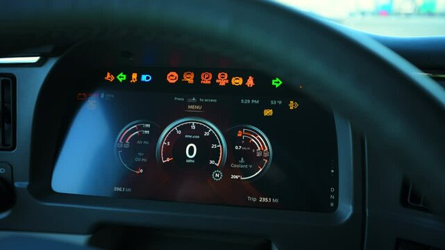  Close up shot of element interior of a new semi truck. turned on engine of truck
