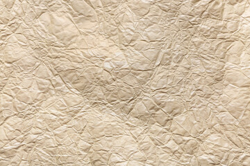 Texture of light crumpled paper, closeup