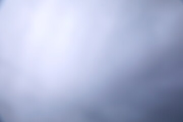 雲をぼかしたグレイの背景素材