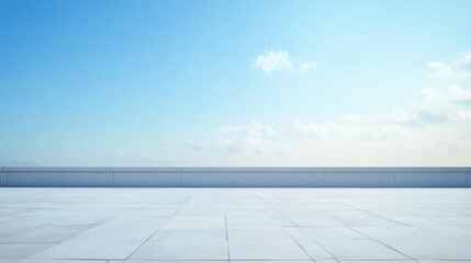 Rooftop work surface under a clear blue sky, featuring an expansive white floor and minimalistic design, ideal for text overlay, architecture, construction, empty space.