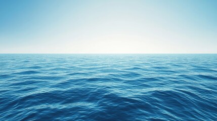 Obraz premium Vast ocean view with gentle waves under clear blue sky, featuring expansive empty space for text, ideal for backgrounds, tranquility, nature, and water themes.