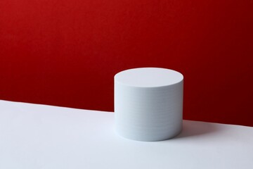 White podium on color background 