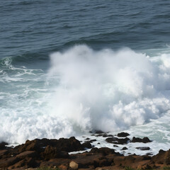 waves crashing on rocks