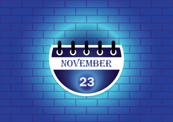 A stylized calendar page displaying November 23rd. The calendar is circular and features a blue and white color scheme. It's set against a textured blue brick wall backdrop