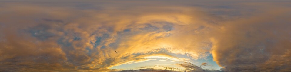 Golden glowing red orange overcast sunset sky 360 hdr panorama. Seamless spherical equirectangular panorama. Sky dome or zenith for 3D visualization and sky replacement for aerial drone 360 panoramas