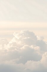 Soft, fluffy clouds illuminated by sunlight.
