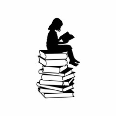 A girl is sitting on a stack of books. She is reading a book. The books are stacked on top of each other