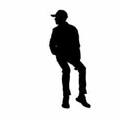 A man is wearing a backpack and a hat