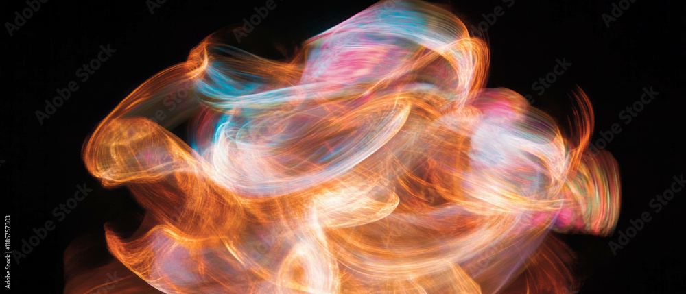 Aufkleber Dynamic colorful fire shapes swirl against a black background creating artistic patterns