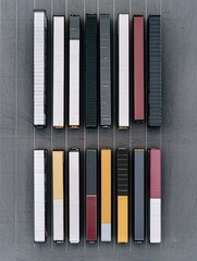 Naklejka premium Fleet of cargo trucks lined up in a transportation depot, awaiting dispatch under a clear logistics strategy