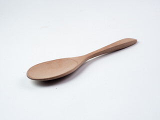 wooden spoon on white background