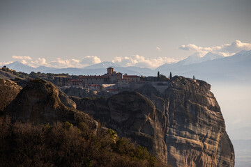 Sunset over Meteora. Amazing landscape of Monastery of the Holy Trinity from Meteora, iconic place for Greek people and orthodox around the world.