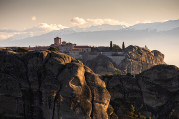 Sunset over Meteora. Amazing landscape of Monastery of the Holy Trinity from Meteora, iconic place for Greek people and orthodox around the world.