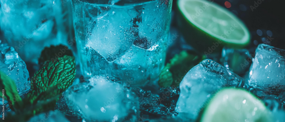 Poster refreshing sparkling water with ice cubes and mint leaves in a vibrant setting