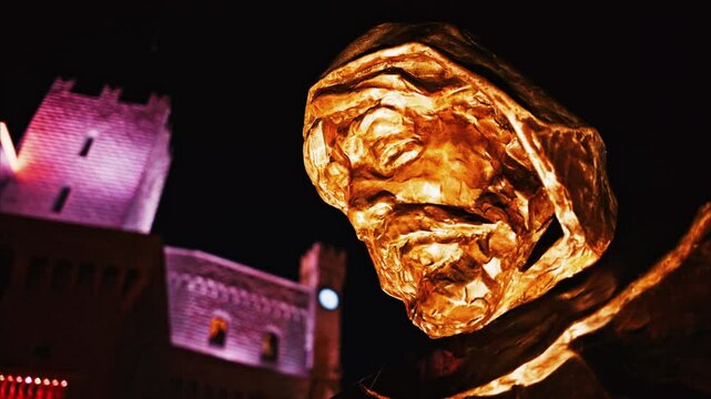 Monaco City, Monaco - October 4, 2024: Statue of Prince Francois Grimaldi with the Palace on the background in the evening