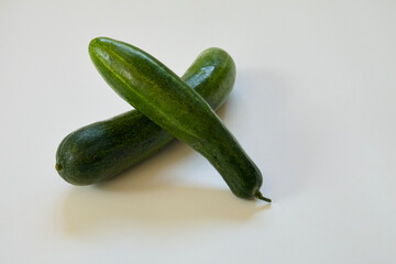 Fresh cucumber on white background