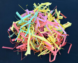Pile of colored hand-cut paper strips