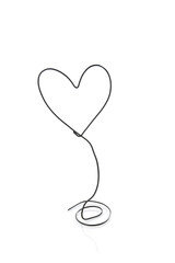 a heart shape made with wire, love concept 