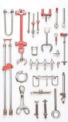 Obraz premium Assorted Industrial Metal Tools and Clamps Arranged on White Background for Mechanical and Engineering Projects