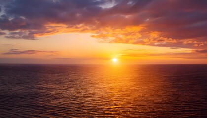Obraz premium sunset over the ocean, Sunset sky clouds over sea in the evening with Orange, Yellow sunlight Golden hour in Summer landscape,