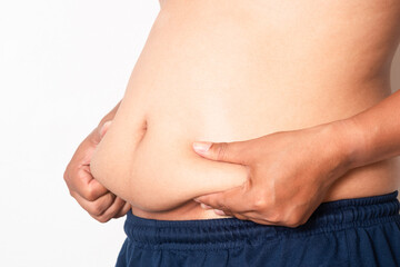Naklejka premium Overweight or obese man on white background. Fat mens body measurements. he is dieting and losing weight. Men at risk for diabetes Belly fat. Healthcare, medicine concept