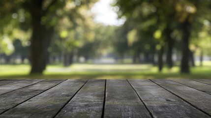 Wooden table in an autumn park with blurred trees, perfect for product display or marketing purposes