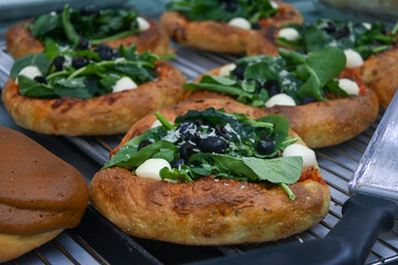 bread topped with vegetables and salads