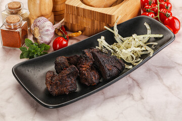 Grilled beef barbecue served onion