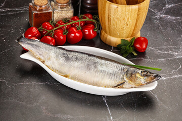 Whole raw salted herring fish