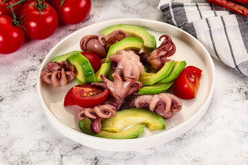 Salad with baby octopus and avocado