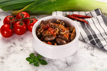 Baked chicken hearts with vegetables