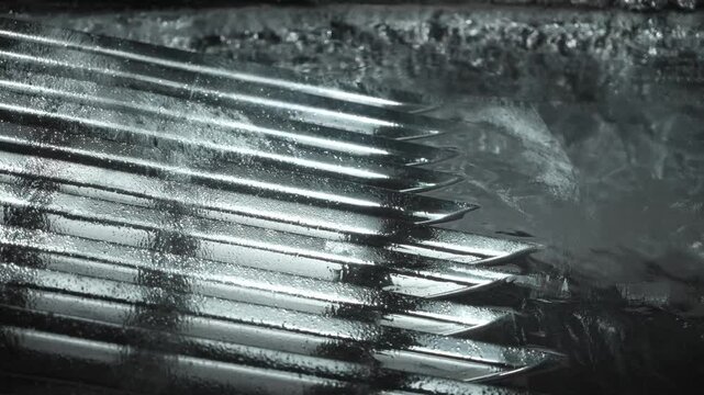 Galvanizing process of large metal products in a bath. Protection against corrosion of steel parts.