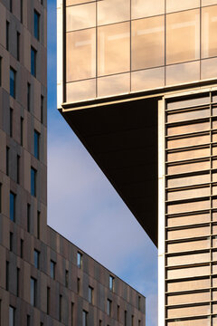 An abstract capture of contemporary architecture featuring clean lines and an overhanging structure that challenges traditional design norms in Poblenou in Barcelona Spain