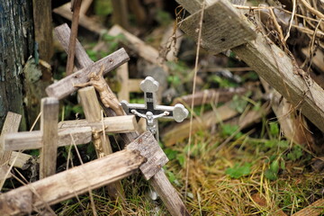 Thousands of religious symbols, crucifixes, rosaries, rosary and catholic crosses with Jesus, Hill of Crosses, Kryžių kalnas,  is a site of pilgrimage north of of Šiauliai, Lithuania