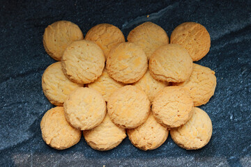 cookies on a black background, close-up, top view