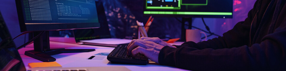 Header with hacker working with metadata on computer