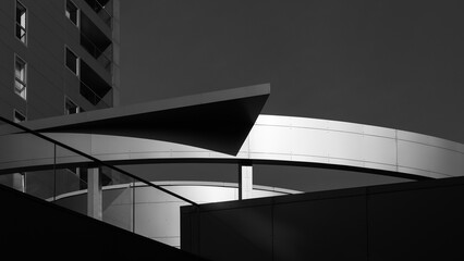 Fototapeta premium ARCHITECTURE - A modern tall residential building against the blue sky