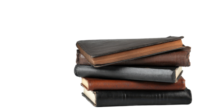 Stack of vintage books with leather covers on a black background.