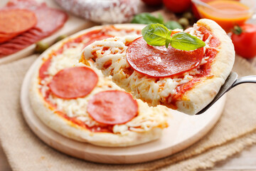 Italian cuisine: pizza with salami