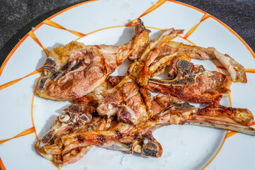 Grilled lamb chops over a wood fire