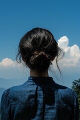 In the picturesque region of Huaraz, Peru, this image showcases hikers dressed for the trails, along with serene lakes, majestic mountains, and a palette of radiant colors, including the iconic
