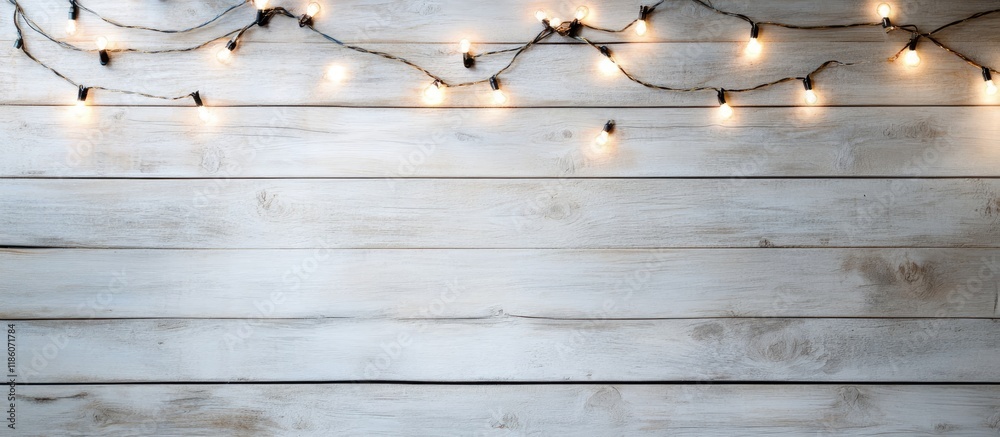 Aufkleber photography featuring fairy lights on a light wood background. with copy space image. place for addi