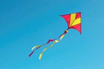Kite with streamers gliding effortlessly through the clear sky, kite, sky, blue