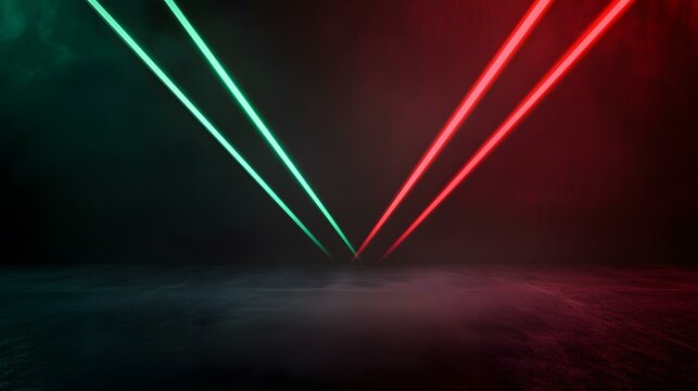 Two parallel neon green and red laser beams converge at a point on a dark, textured floor.