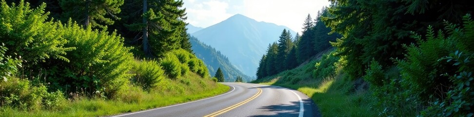 Fototapeta premium Mountain road winds through dense foliage under clear sky, trees, scenery, clear