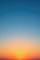 Soft blue sky gradually transitions to warm orange hues at sunset, sunset, gradient