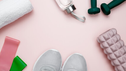 Athletes equipment set dumbbells, resistance band, foam roller for Myofascial release, healthy lifestyle