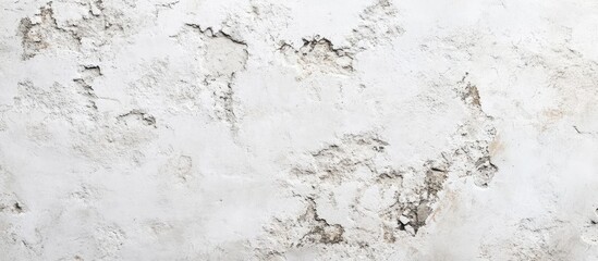 Obraz premium A vintage or grungy white background featuring the natural texture of old cement or stone as a retro pattern wall It serves as a concept conceptual or metaphor wall banner showcasing grunge materia