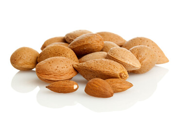 almonds with and without nutshells on white background